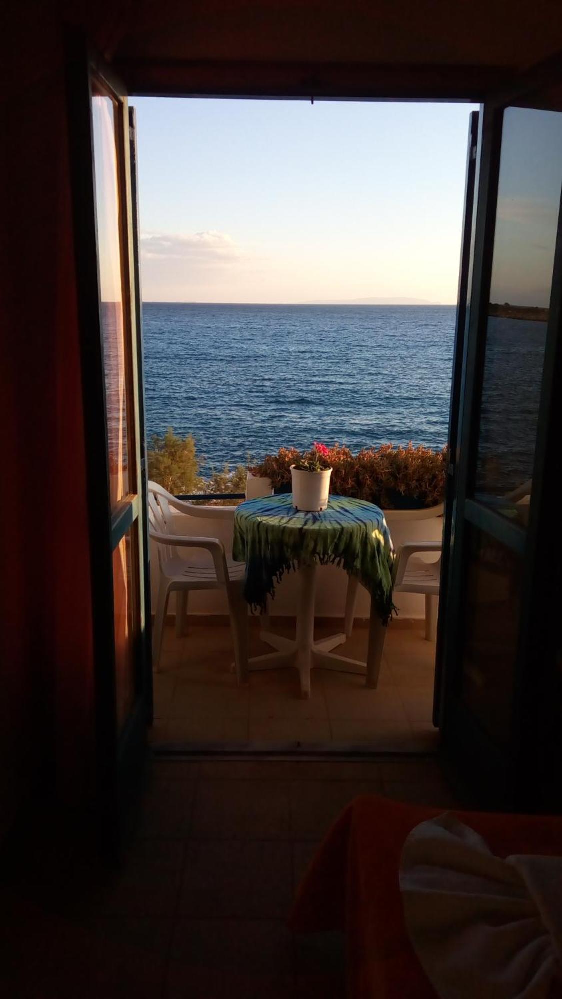 Taverna Akrogiali Лутрон Экстерьер фото