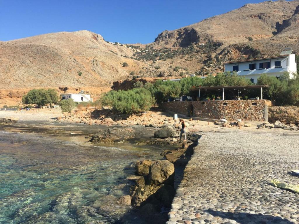Taverna Akrogiali Лутрон Экстерьер фото